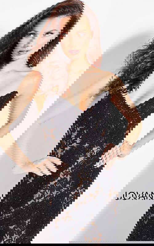 Model wearing Jovani 37334 black lace mermaid gown with sweetheart neckline