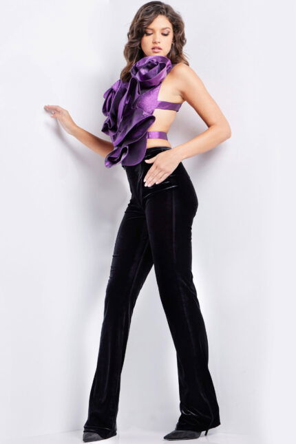 model wearing Jovani 37362 purple floral top with black pants, side view
