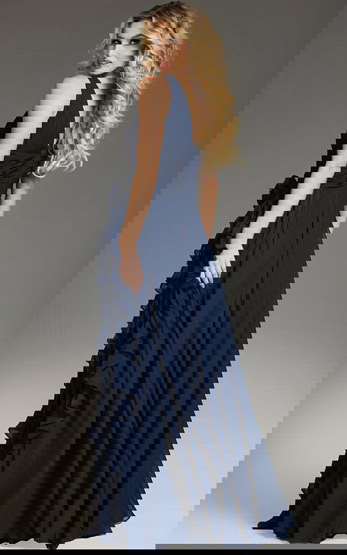 Model wearing Jovani 37374 navy gown with A-line silhouette, back view.