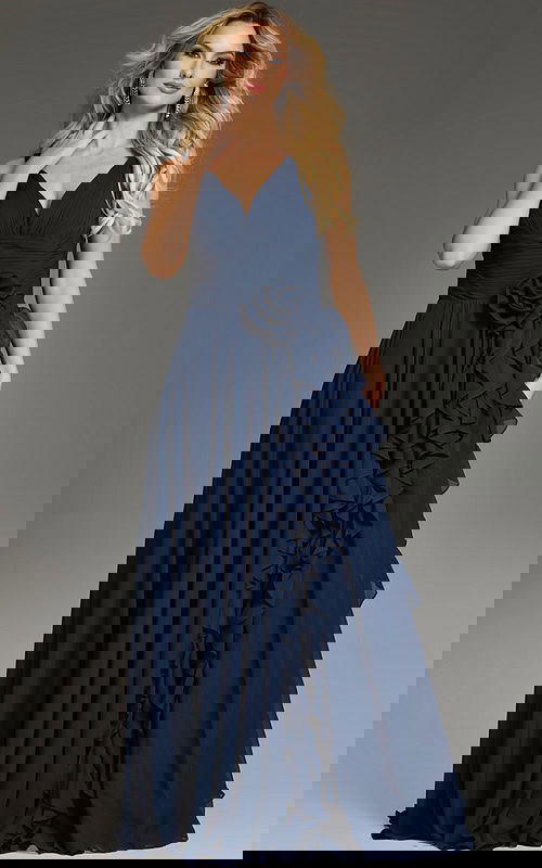 Model wearing Jovani 37374 navy gown with A-line silhouette and ruffle detail, front view.