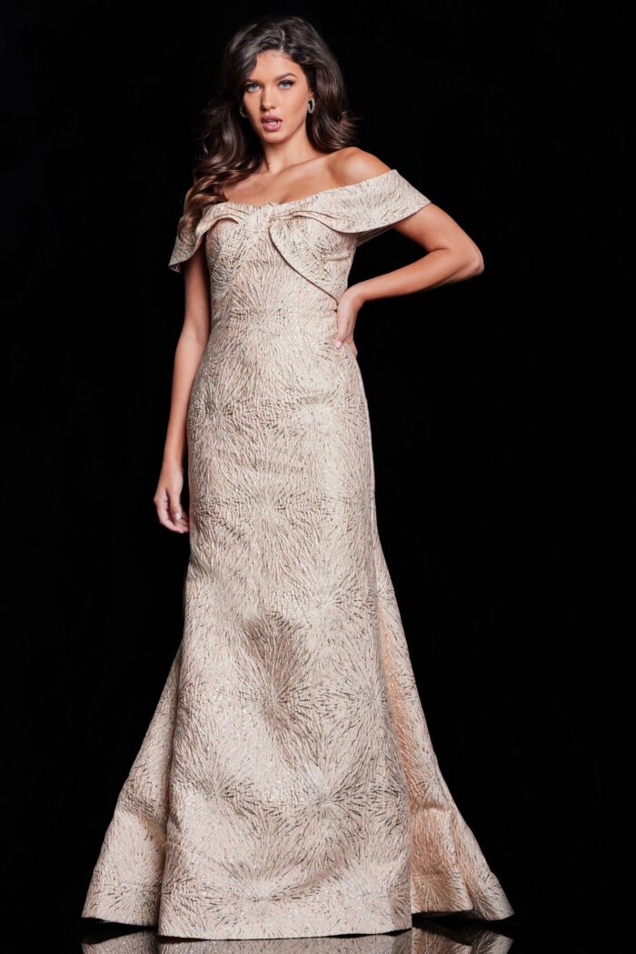 Model wearing Jovani 37394, beige off-the-shoulder gown, front view.