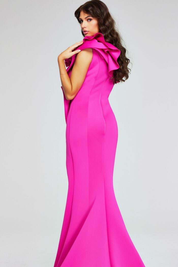 Back view of model in Jovani 37400 fuchsia gown with elegant design.