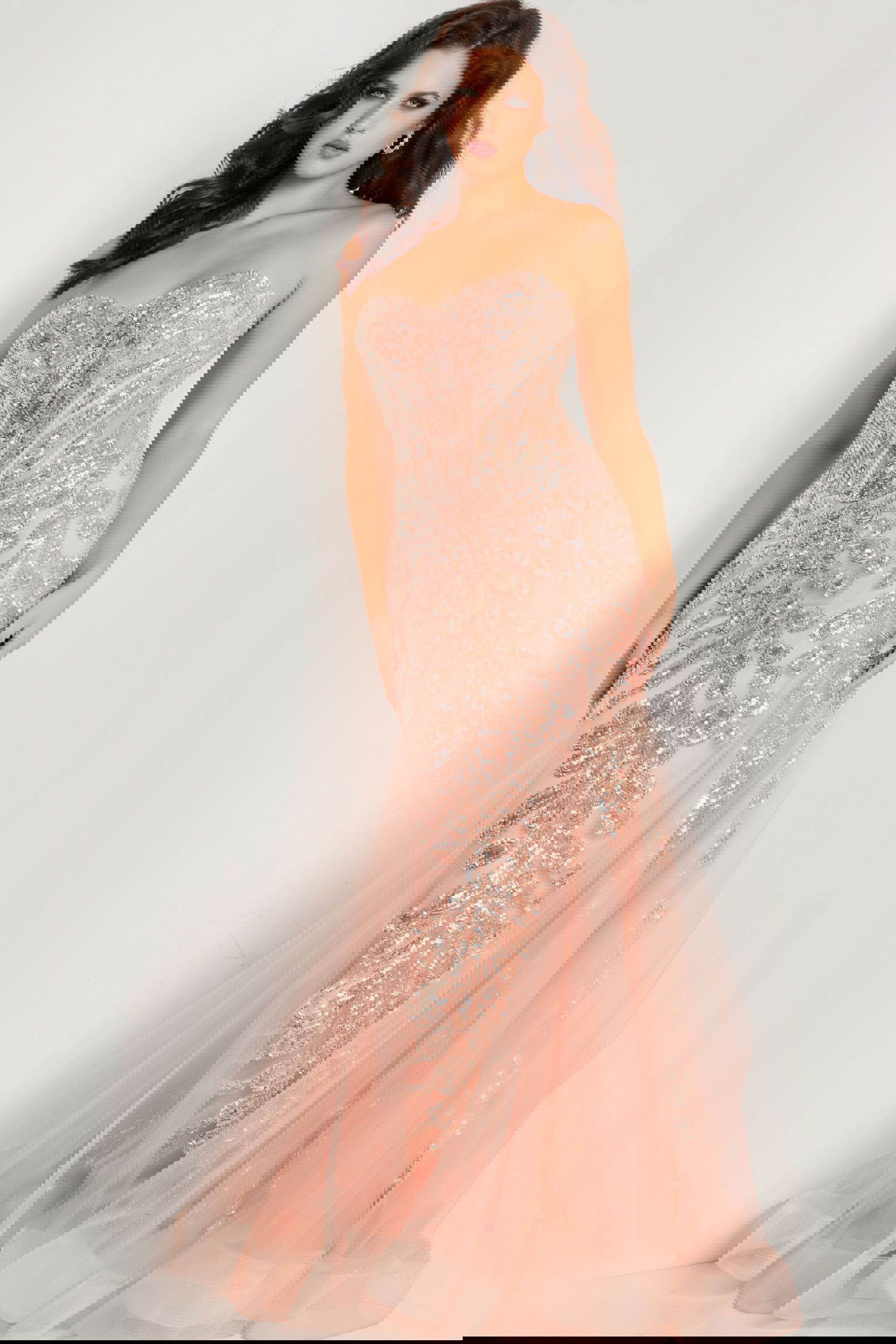 37412_blush.jpg Model wearing Jovani 37412 blush gown with embellished bodice and strapless neckline