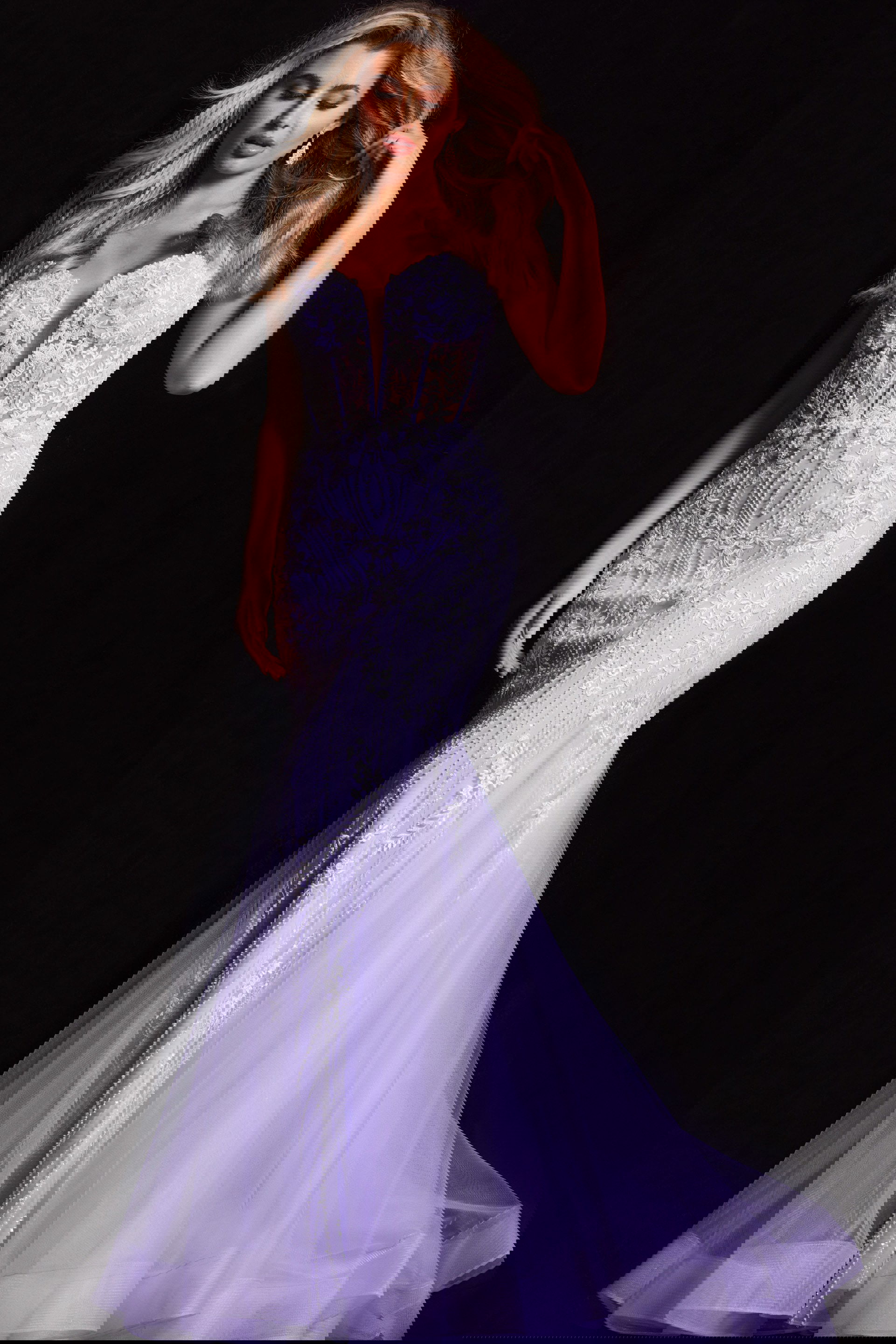 37414-204.jpg Model wearing Jovani 37414 lilac mermaid gown with floral embellishments from the front.