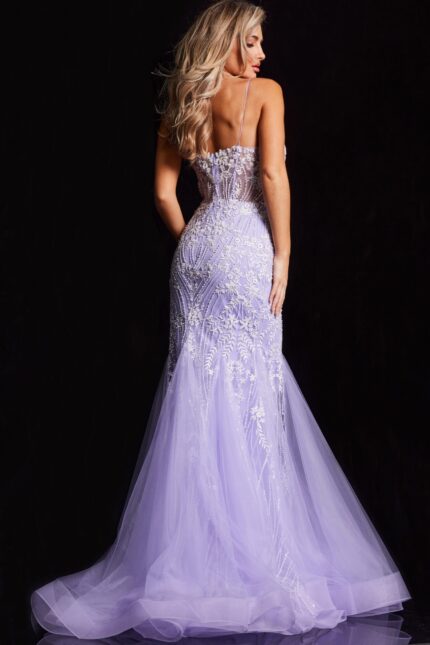 Back view of model in Jovani 37414 lilac mermaid gown with lace floral design.