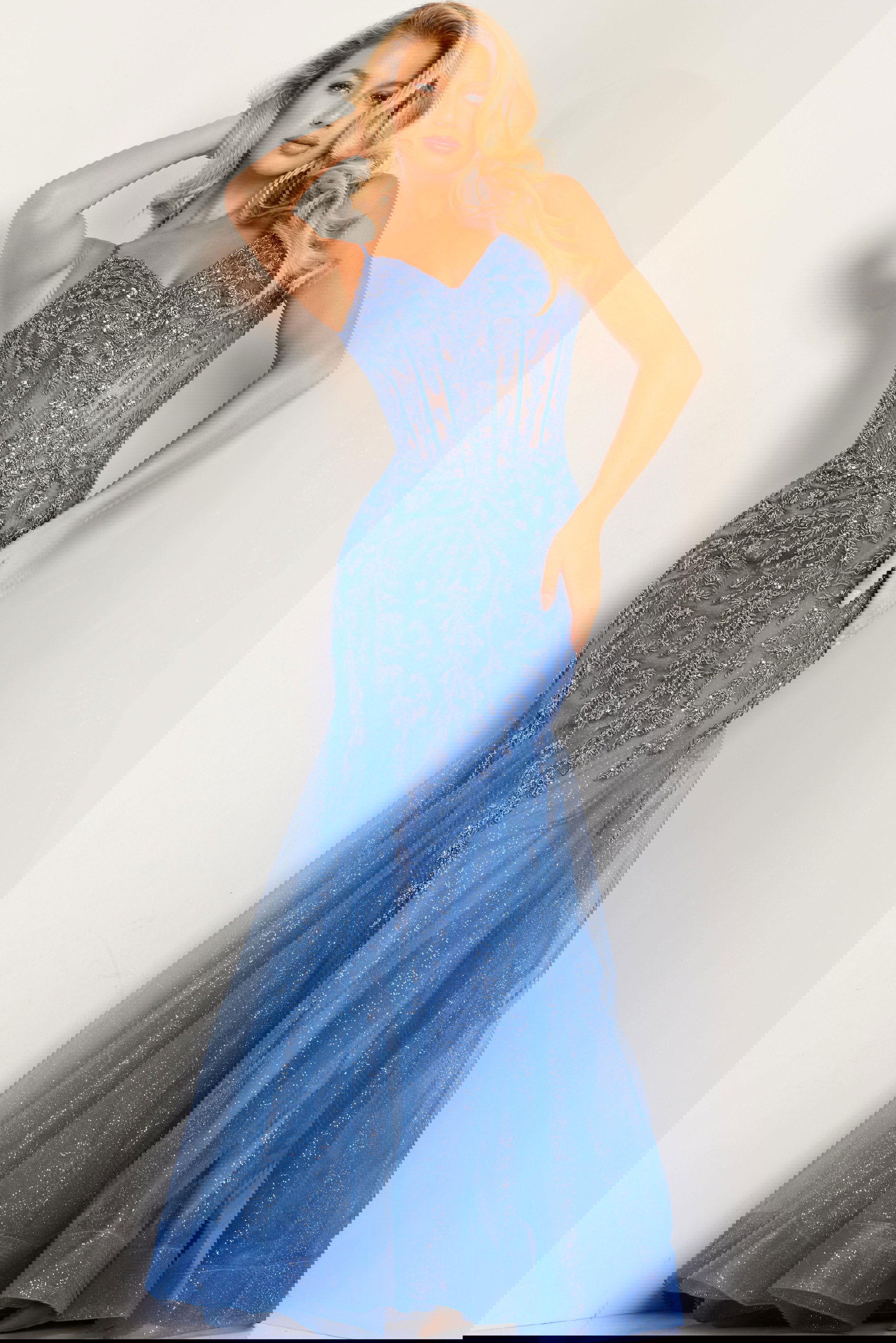 37416_8.jpg Model wearing Jovani 37416 blue gown with sweetheart neckline and intricate beadwork, front view.