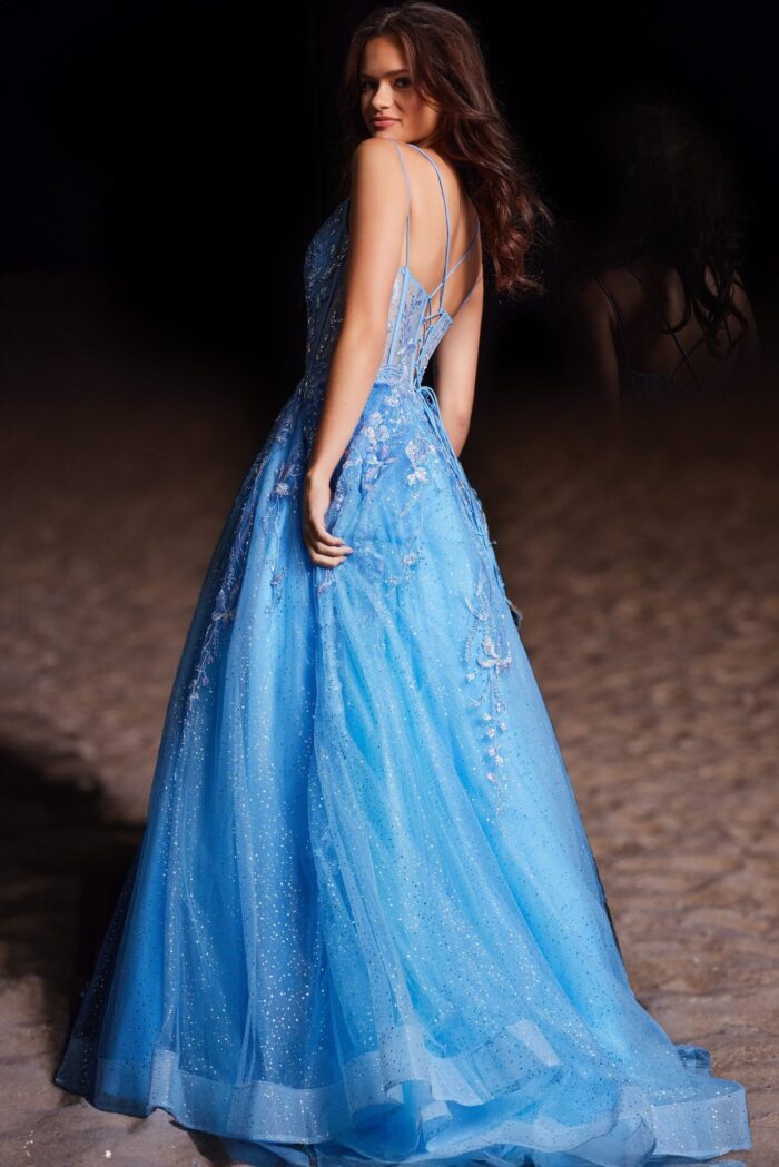 Side view of Jovani 37421, a royal blue ball gown with floral details and double straps.