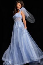 Model in Jovani 37466 light purple gown showing detailed bodice and flowing skirt.