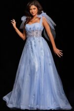 Model wearing Jovani 37466 light purple gown with sweetheart neckline and tulle bows.