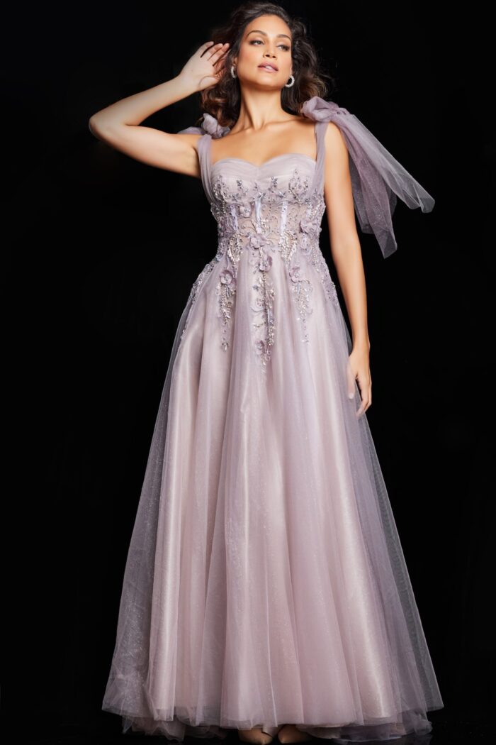 model wearing 37467 elegant blush gown with sweetheart neckline and floral details