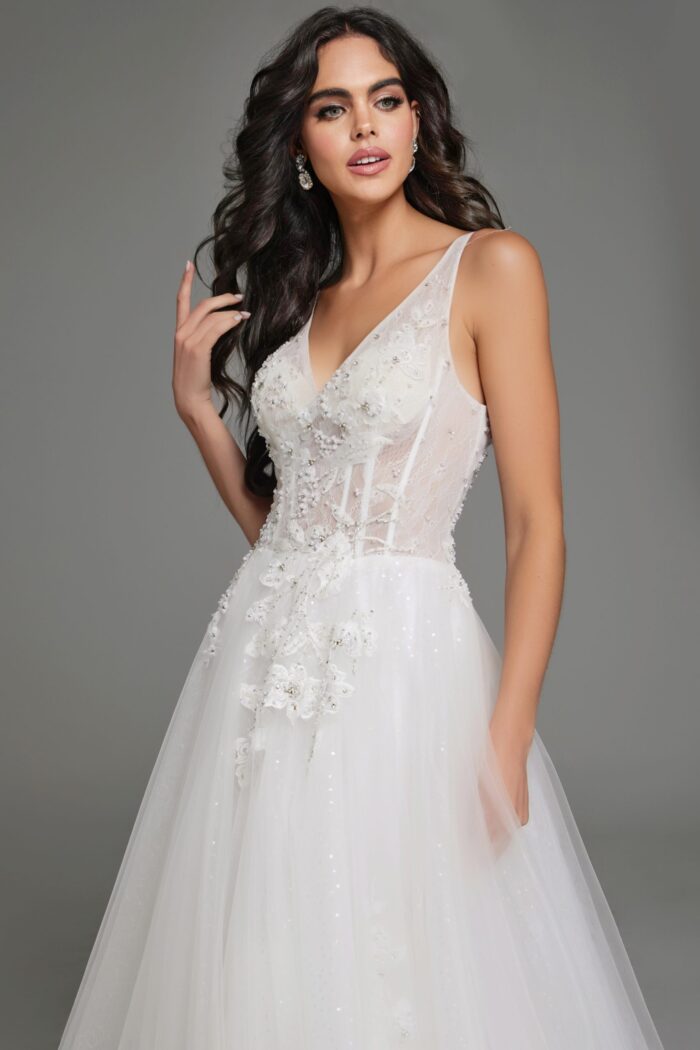 Close-up of model wearing Jovani 37468 white gown with floral embellishments.