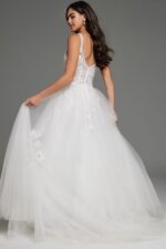 Back view of model in Jovani 37468 white gown showcasing intricate floral detailing.