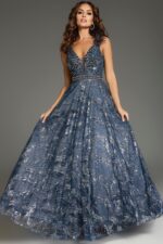 Model wearing Jovani 37551 gown with intricate beadwork on the front