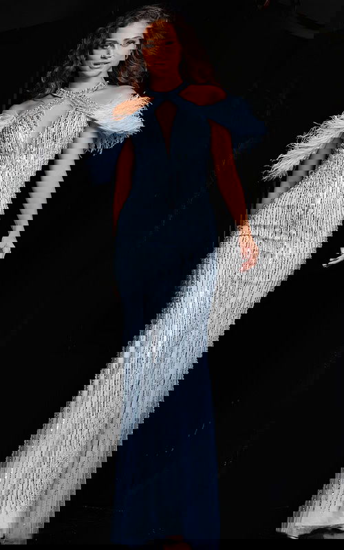 Model wearing Jovani 37563 baby blue gown with feathers and beading, front view.