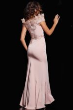 Model wearing Jovani 37572 blush gown, back view highlighting the dress silhouette.