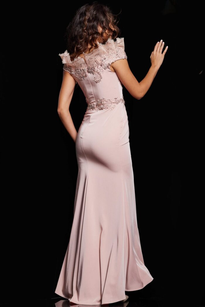 Model wearing Jovani 37572 blush gown, back view highlighting the dress silhouette.