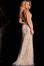 Model wearing Jovani 37577 gown, back view highlighting deep V-back and embellishments.