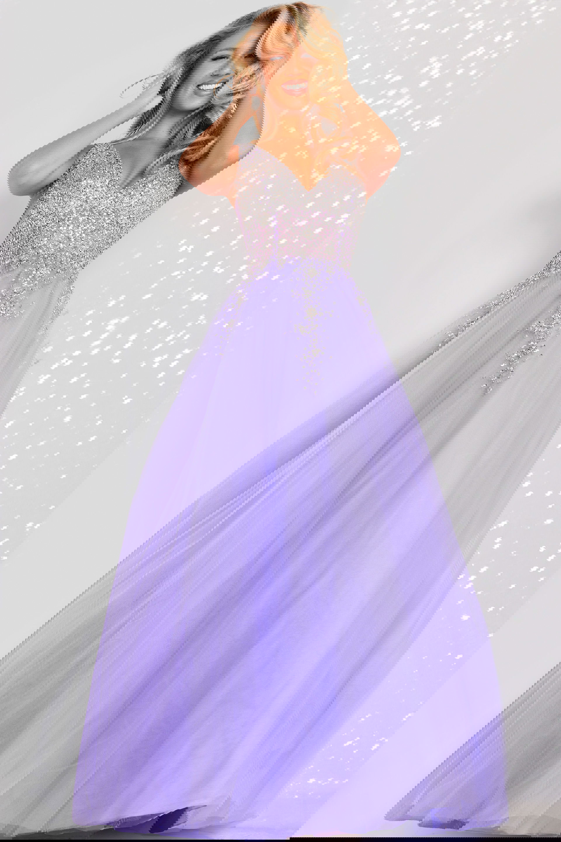 37589_3-purple.jpg model wearing 37589 lilac dress with V-neckline and embellished bodice