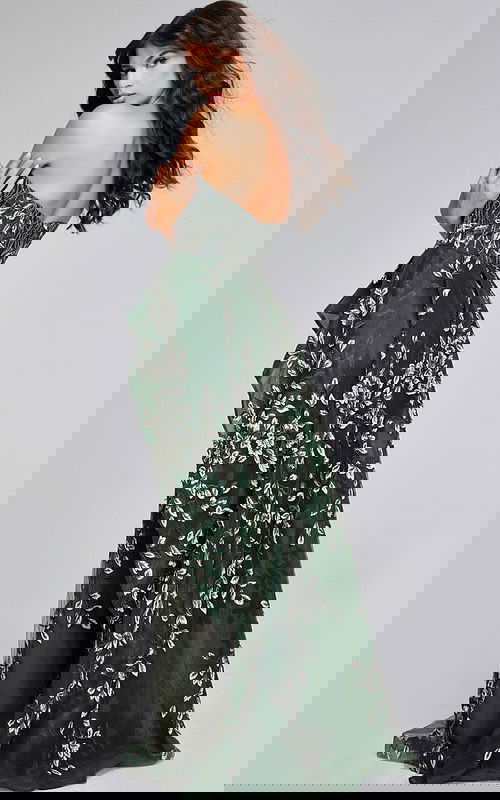 Model wearing Jovani 37599 dark green dress, back view showing the train and design.