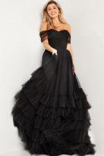 model in Jovani 37608 off-the-shoulder gown showing ruffle detail