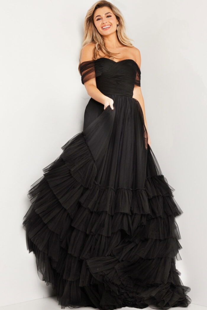 model in Jovani 37608 off-the-shoulder gown showing ruffle detail