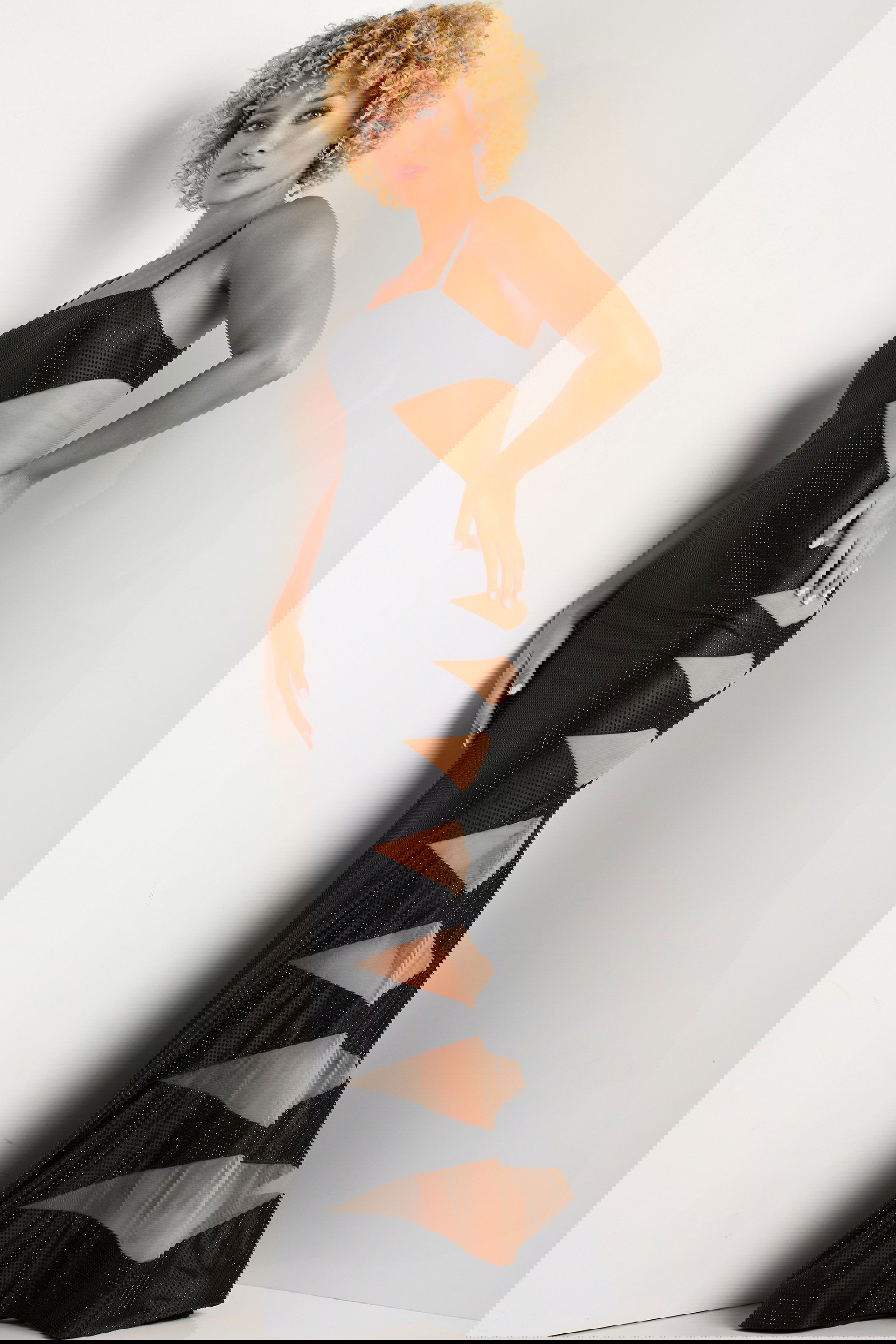 37618-black-side.jpg Model wearing Jovani 37618 black dress with side cutouts