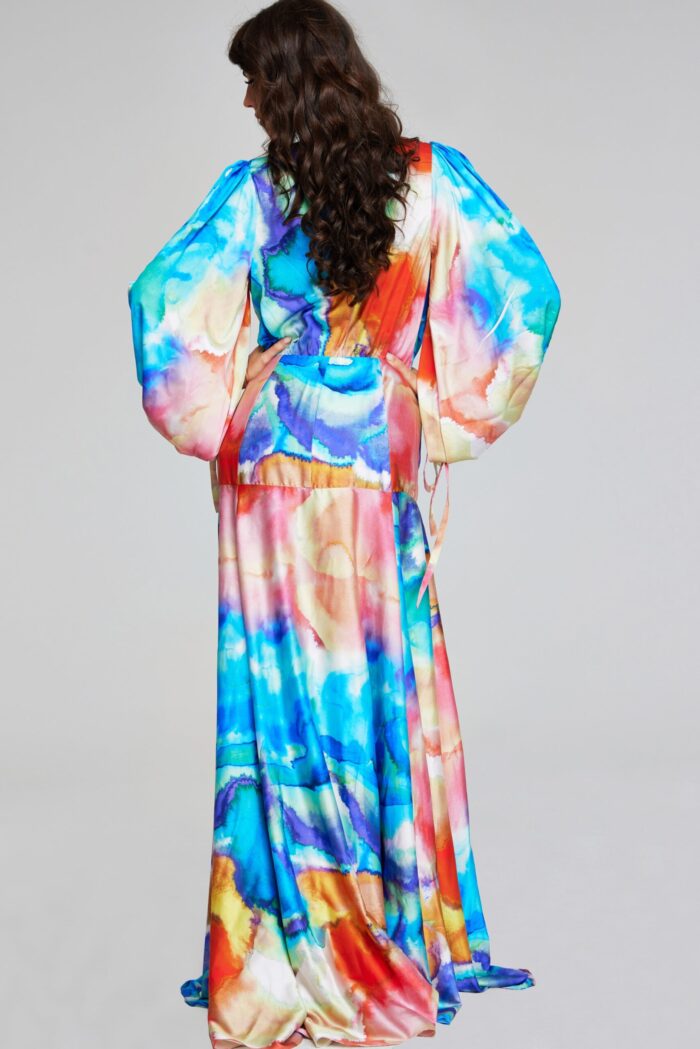 Back view of model in Jovani 37669 showcasing multi-colored flowing gown.