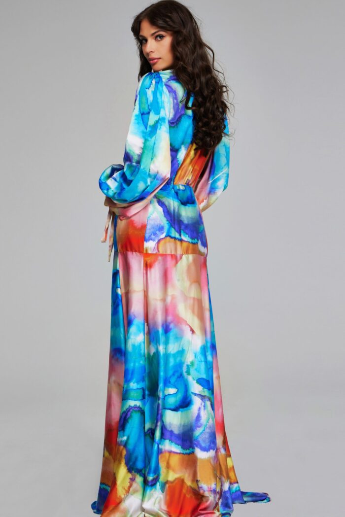 Model wearing Jovani 37669 full-length gown with vibrant multi-colored design from the front.