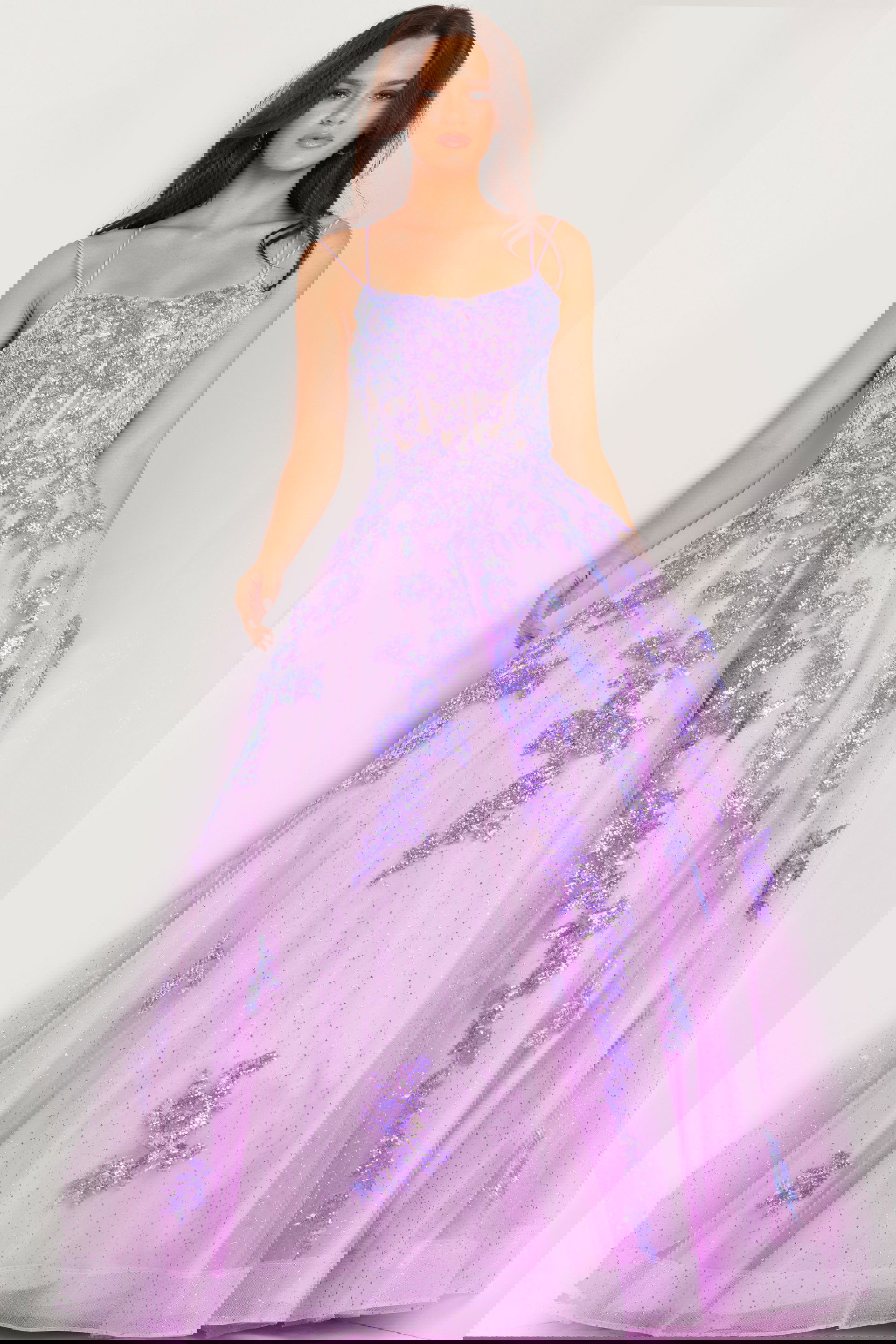 37700-20purple-ballgown.jpg Model wearing Jovani 37700 lilac ball gown with floral appliqué and beadwork, front view.