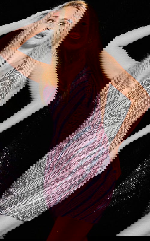 Model wearing Jovani 37974 pink sleeveless dress with V-neck