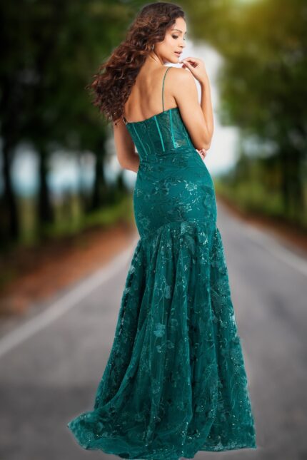 Back view of model in Jovani 38004 dark green dress showcasing elegant flare.