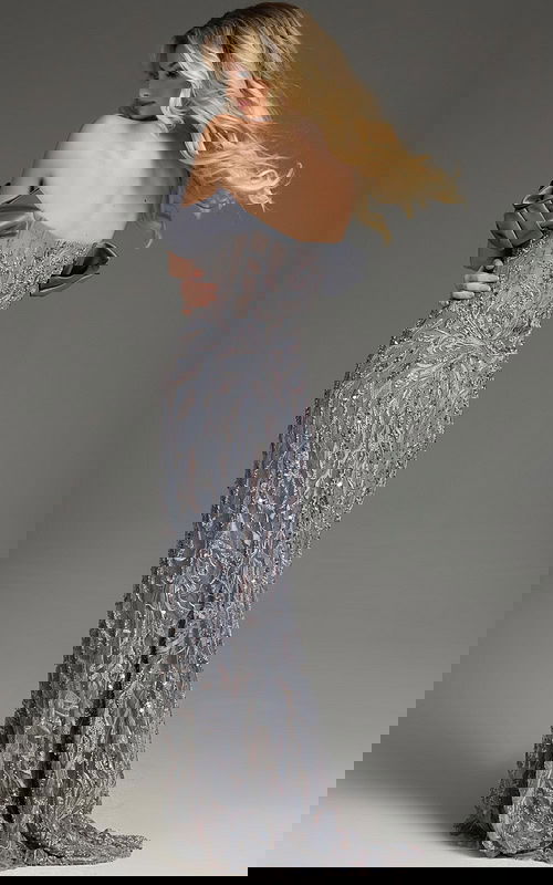 back view of model wearing Jovani 38111 gray gown showing off-the-shoulder design and beadwork