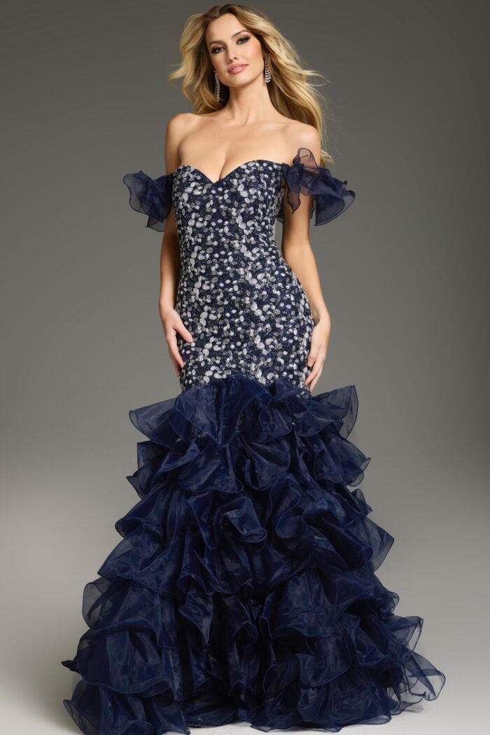 Model wearing Jovani 38115 navy mermaid dress with sequin embellishments, front view.