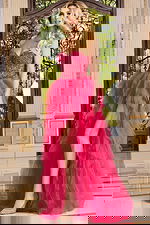 model wearing Jovani 40816 pink dress with layers of tulle and beaded bodice