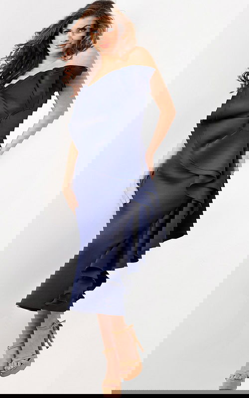 Model wearing Jovani 38187 navy dress, front view, showcasing off-the-shoulder neckline and ruffles.