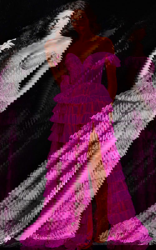 model wearing 38251 pink dress with sweetheart neckline and ruffled layers