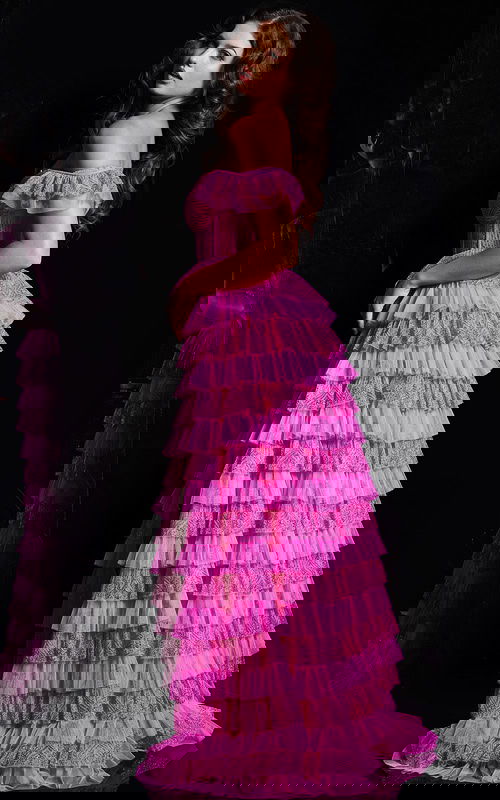 back view of model wearing 38251 pink ruffled dress