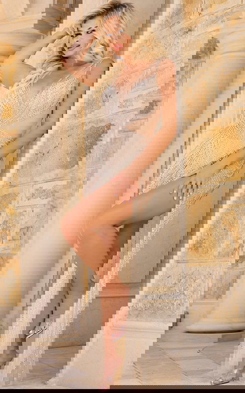 model wearing 38273 nude gown side front view