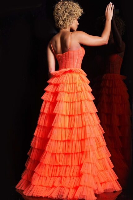 Back view of model wearing Jovani 38277 orange gown with tiered ruffles