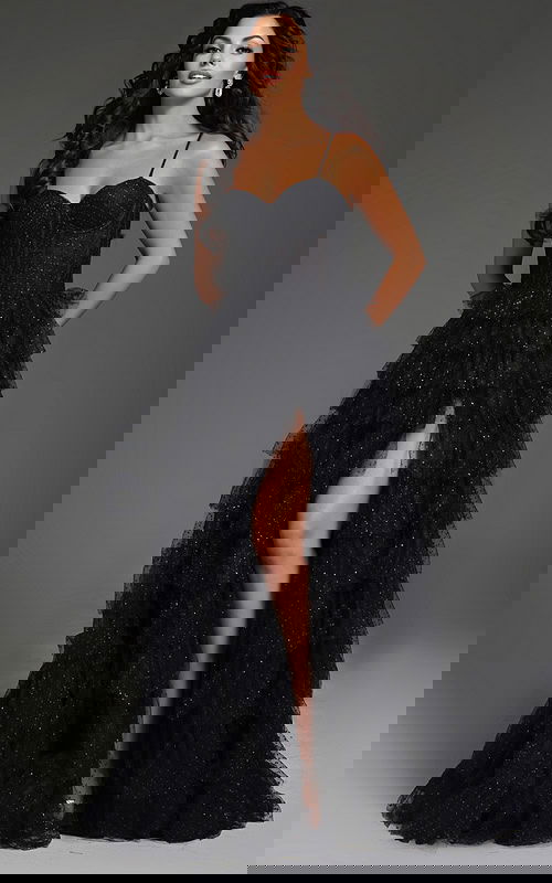 Model wearing Jovani 38278 black evening gown with high slit and sweetheart neckline.