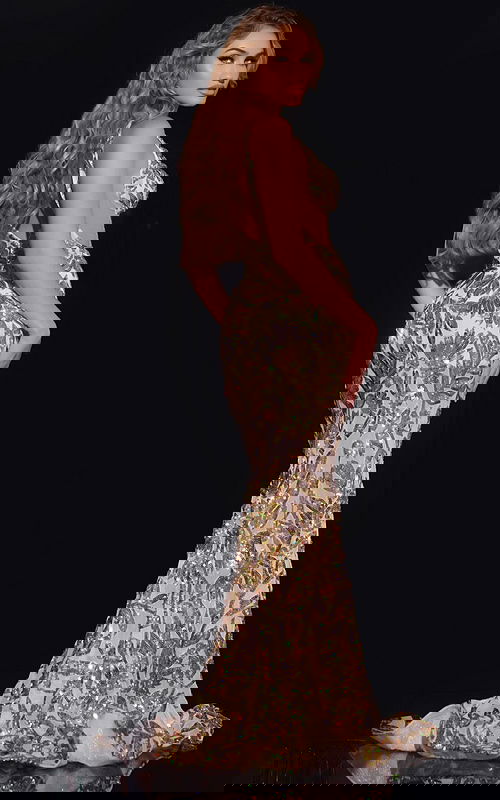 Model wearing Jovani 38349 gold sequin gown, back view.