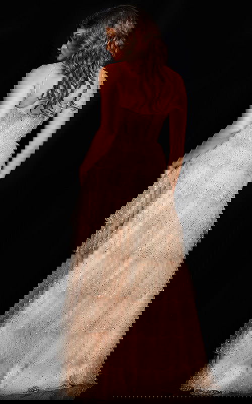 Back view of model wearing Jovani 38431 beige gown showing layered tulle.