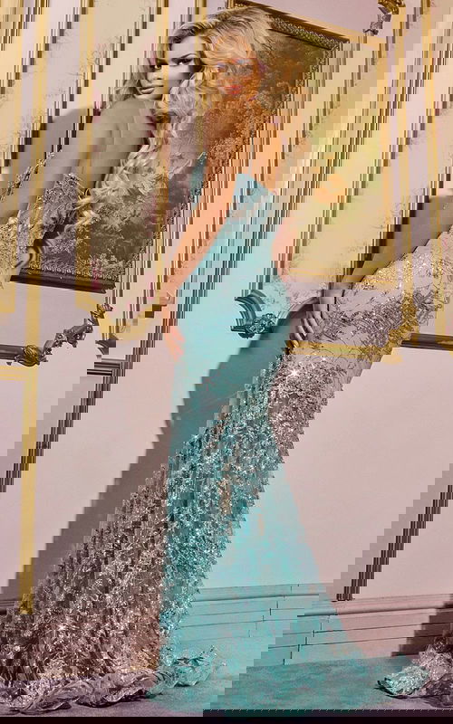 Model wearing Jovani 38468 back view highlighting the intricate beadwork and elegant silhouette.