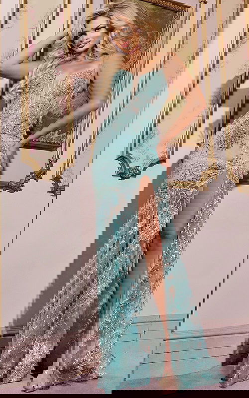 Model wearing Jovani 38468 front view showcasing the elegant high-slit design with shimmering details.