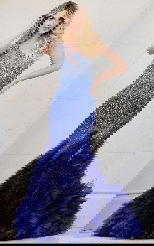 Model wearing Jovani 38507 blue gown with embellishments and luxurious skirt, angled front view