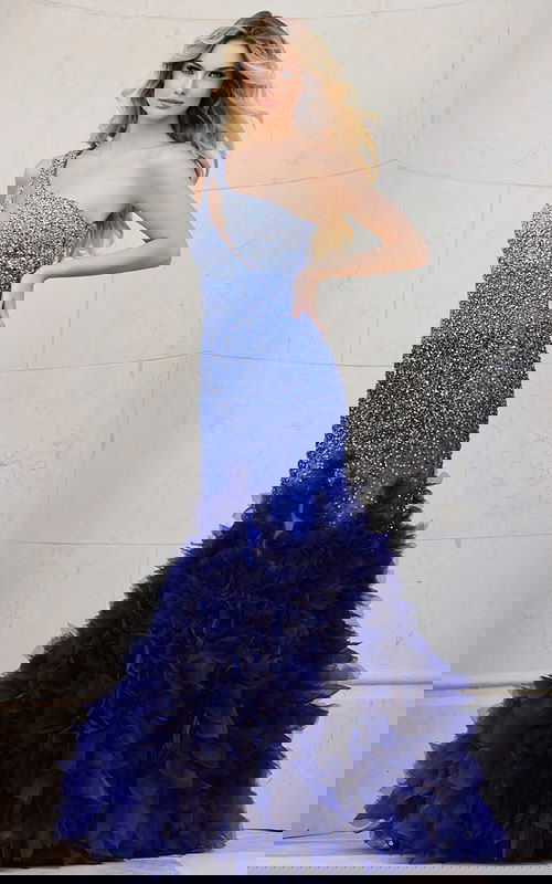 Model wearing Jovani 38507 blue gown with sparkling details and ruffle skirt, facing front