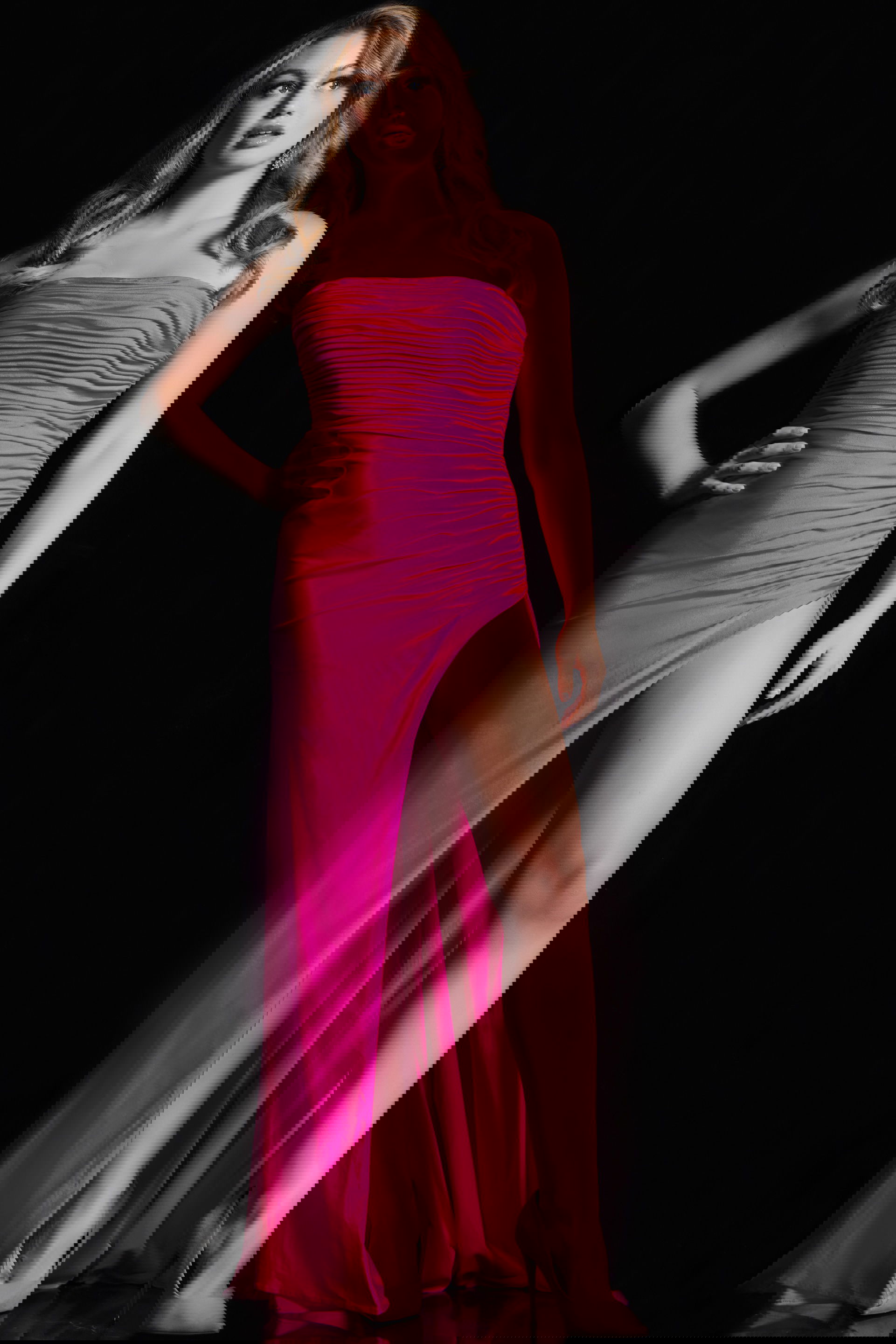 38564-HOTPINK-3.jpg Model wearing Jovani 38564 hot pink dress with strapless neckline and high slit.