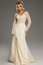 Model displaying front of Jovani 38581 gold gown, with V-neck and high slit.