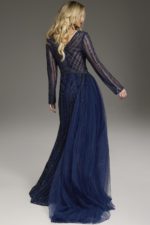 Back view of model wearing Jovani 38581 navy gown with sheer long sleeves.