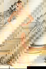 Strapless beaded gown with intricate embroidery and high slit